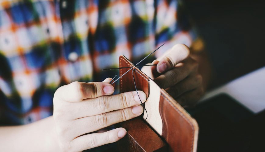 Person Knitting Brown Leather Textile